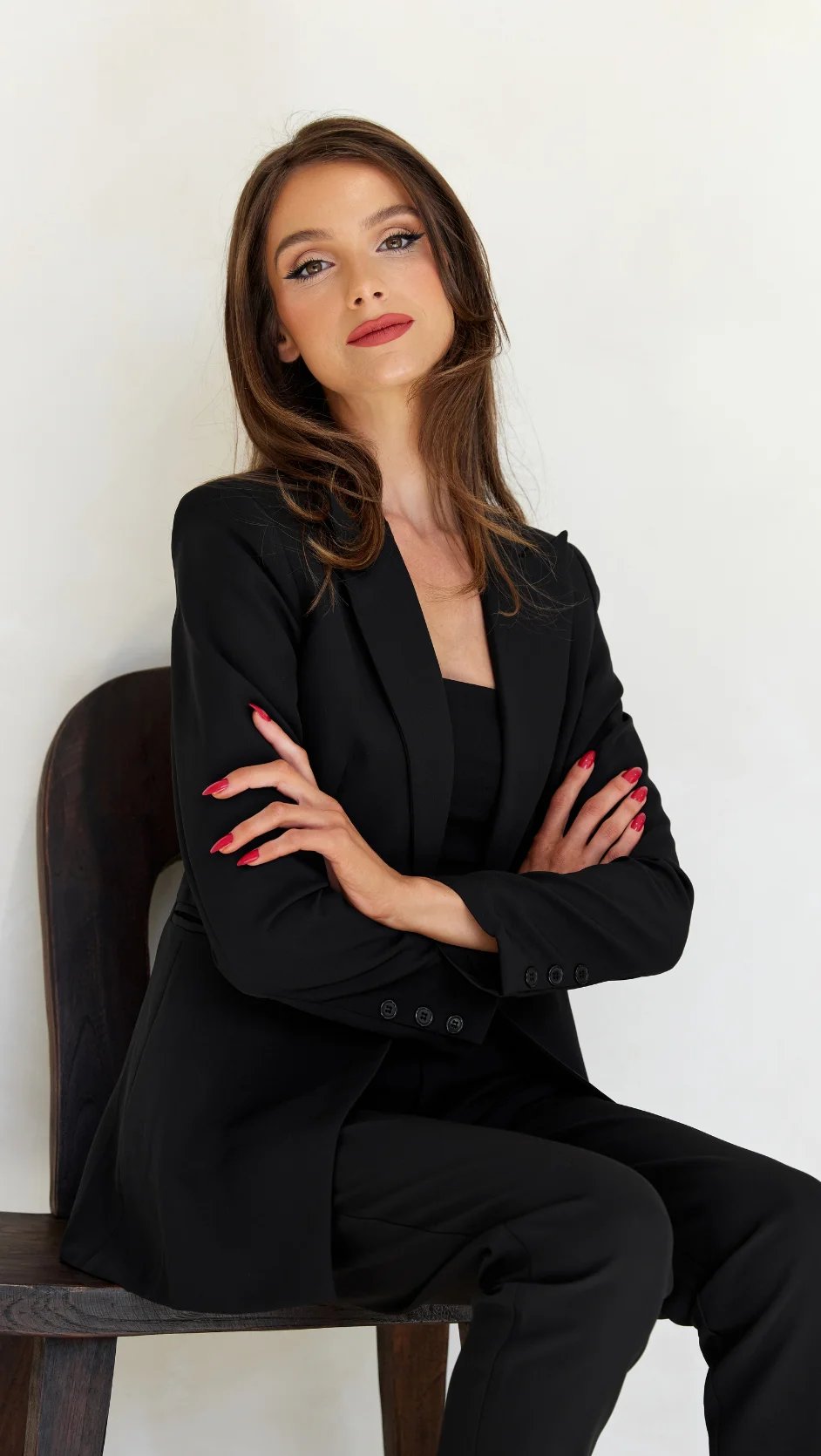 Femme Creative founder in a black suit
